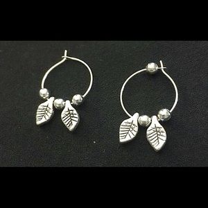 handmade small silver leaf hoops